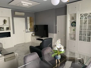 living laccato bianco e pareti grigie moderno-turati boiseries